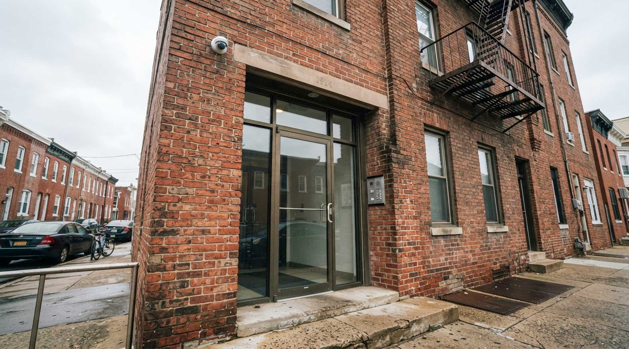 Security camera above the entrance of a Philadelphia multifamily apartment building